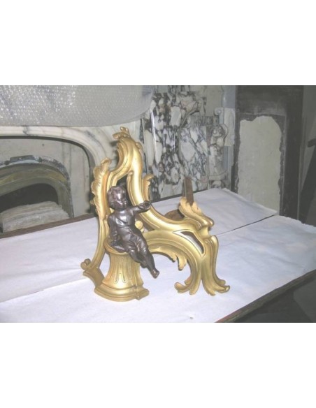 048 DORATURA AD ORO ZECCHINO, COPPIA DI ALARI CON PUTTI