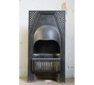 A small Art Deco cast iron fireplace that is a true design object signed GENTIL & BOURDET.