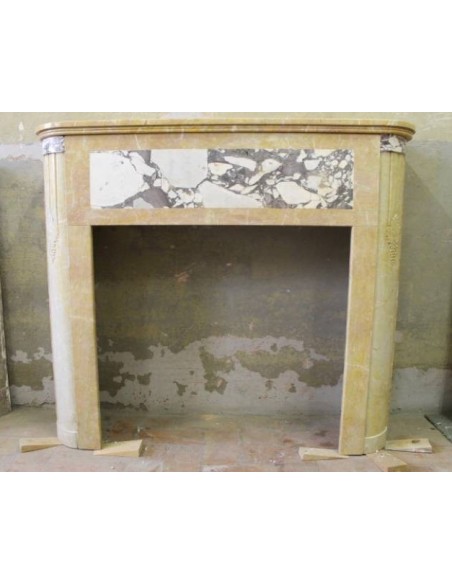 Original Art Deco fireplace, carved in Giallo Siena marble and Breccia Violetta (Brèche Violette).