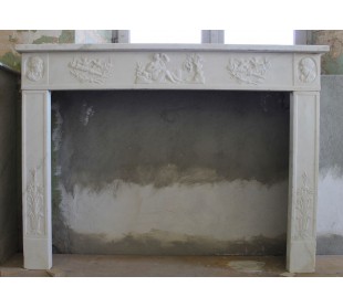 Exceptional Directoire-style statuary marble fireplace. This is a truly antique fireplace in a very white marble.