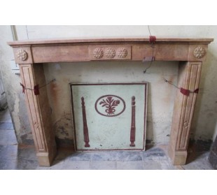 Antique Neoclassical fireplace mantel carved in "Pretty” stone with sunflower floral carvings.