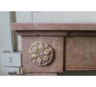 Antique Neoclassical fireplace mantel carved in "Pretty” stone with sunflower floral carvings. 2