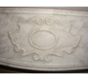 Antique Piedmontese fireplace, between Art Nouveau and Regency, carved in Carrara marble.