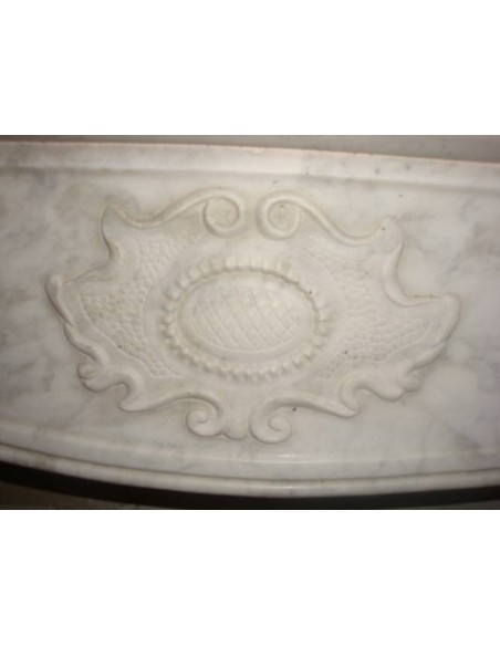 Antique Piedmontese fireplace, between Art Nouveau and Regency, carved in Carrara marble.